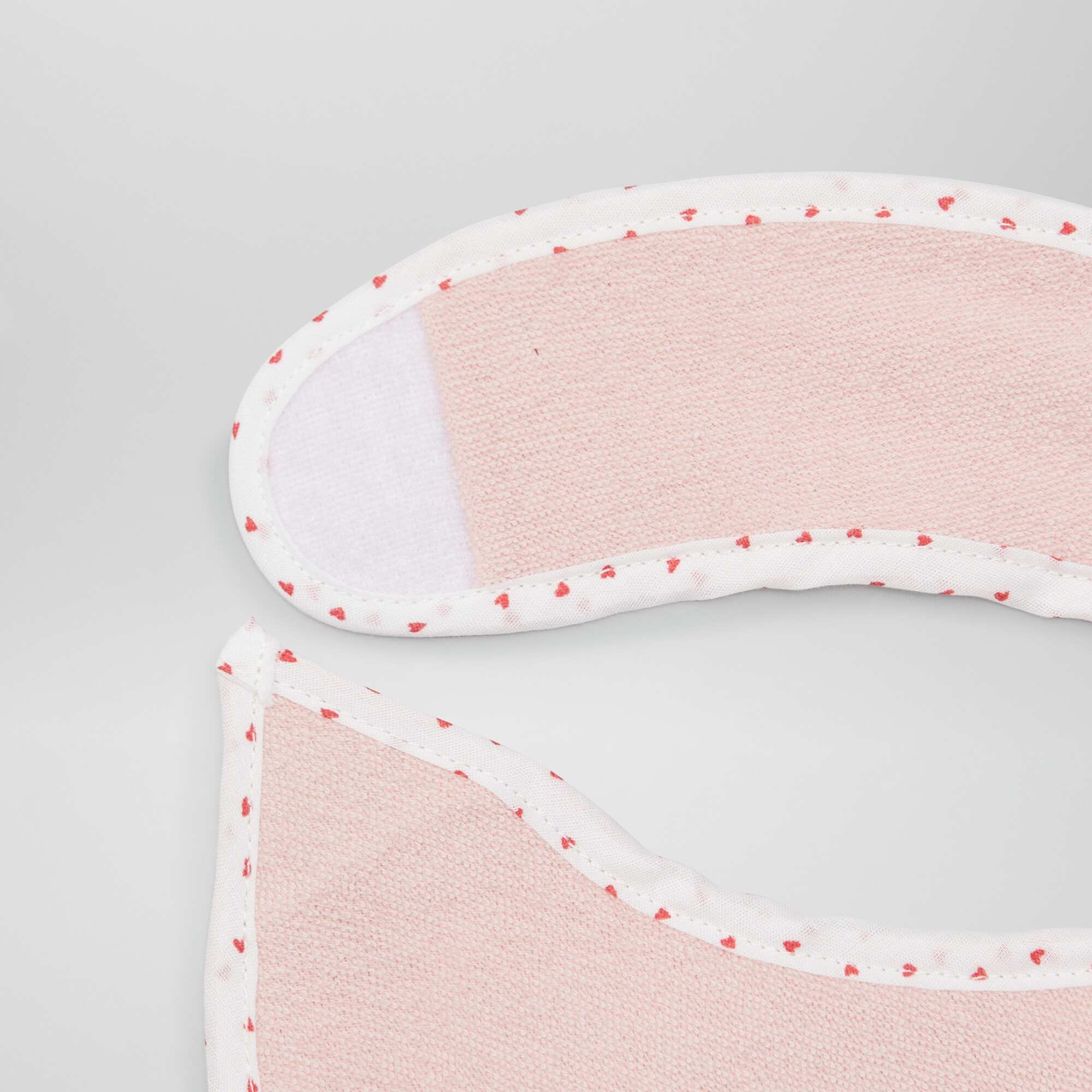 Pack of 7 towelling bibs with hook and loop fastening WHITE - Image 9